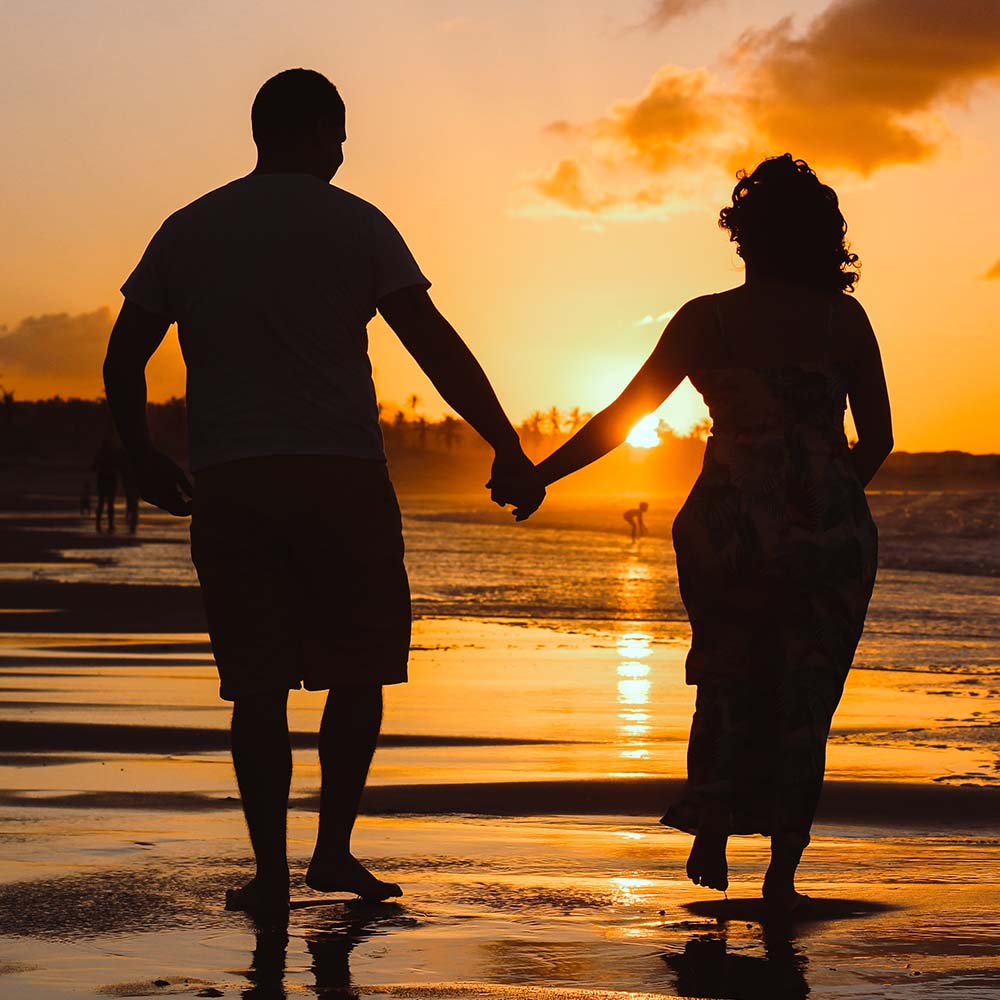 couple on beach near Portside Ventura Harbor in Ventura, California